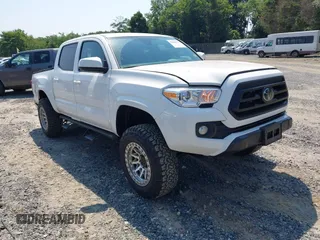 2023 Toyota Tacoma SR with VIN 3TYCZ5AN0PT159414, listed as a IAAI auction lot 42600779 with 16,662 mi miles and . Bid and sale history available at DreamBid. Image 1.