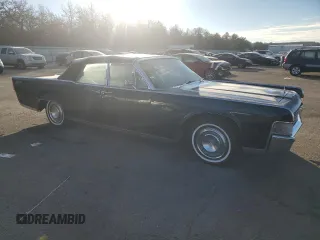 1965 Lincoln Continental with VIN 5Y86N428064, listed as a Copart auction lot 76812744 with 15,659 mi miles and Salvage Title. Bid and sale history available at DreamBid. Image 4.