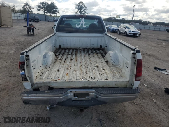 1999 Ford F-150 z VIN 1FTRF17W9XNB67119, wystawiony jako Copart lot #79197414 z przebiegiem Nie podano mil oraz Szkoda całkowita • Salvage title. Historia ofert i sprzedaży dostępna na DreamBid. Obrazek 6.