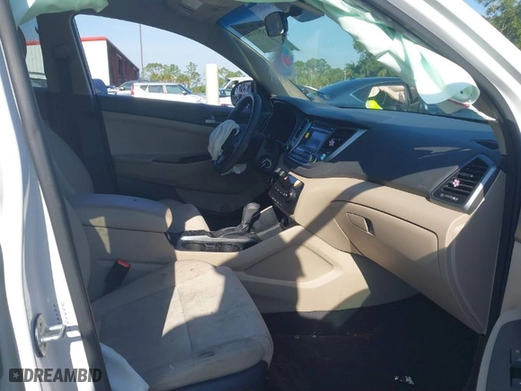2018 Hyundai Tucson SE with VIN KM8J23A42JU627533, listed as a IAAI auction lot 41880112 with 61,840 mi miles. Bid and sale history available at carsss.com. Image 5.
