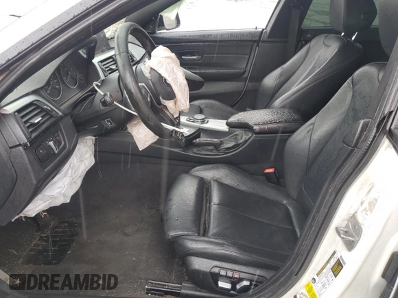 2016 BMW 4 Series 428i xDrive with VIN WBA4C9C58GG136718, listed as a Copart auction lot 55225815 with 169,356 mi miles and Salvage title. Bid and sale history available at DreamBid. Image 7.