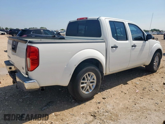 2015 Nissan Frontier SV with VIN 1N6AD0ER8FN709073, listed as a Copart auction lot 57821555 with 191,708 mi miles and Salvage title. Bid and sale history available at DreamBid. Image 3.
