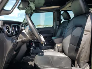 2021 Jeep Wrangler Unlimited Sahara Altitude with VIN 1C4HJXEM9MW596278, listed as a Copart auction lot 61005625 with 47,033 mi miles and Salvage title. Bid and sale history available at DreamBid. Image 7.