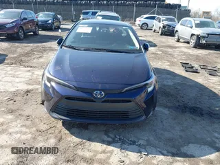 2023 Toyota Corolla Hybrid LE with VIN JTDBCMFE7PJ005985, listed as a IAAI auction lot 41574856 with 31,568 mi miles. Bid and sale history available at carsss.com. Image 12.