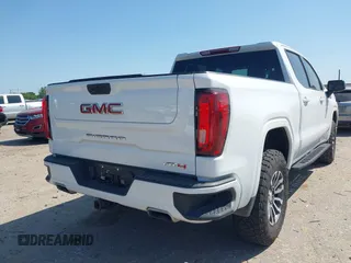 2021 GMC Sierra 1500 AT4 with VIN 3GTP9EED1MG448181, listed as a IAAI auction lot 41984780 with 87,902 mi miles. Bid and sale history available at carsss.com. Image 4.