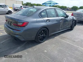 2022 BMW 3 Series 330i with VIN 3MW5R1J0XN8C41168, listed as a IAAI auction lot 42322526 with 44,889 mi miles and . Bid and sale history available at DreamBid. Image 4.