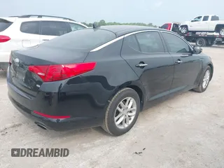 2013 Kia Optima LX with VIN 5XXGM4A70DG249828, listed as a IAAI auction lot 42074167 with 143,986 mi miles. Bid and sale history available at carsss.com. Image 4.