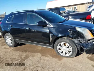 2014 Cadillac SRX with VIN 3GYFNAE32ES550136, listed as a IAAI auction lot 41219755 with 161,878 mi miles and . Bid and sale history available at DreamBid. Image 13.