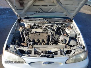 1999 Ford Escort SE with VIN 1FAFP13P8XW185612, listed as a IAAI auction lot 41097304 with 221,752 mi miles. Bid and sale history available at carsss.com. Image 10.