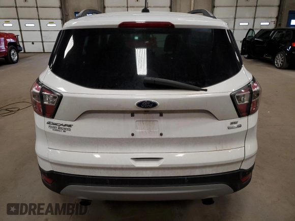 2017 Ford Escape SE with VIN 1FMCU9G96HUA26063, listed as a Copart auction lot 52075765 with 165,444 mi miles and Salvage Title. Bid and sale history available at carsss.com. Image 6.