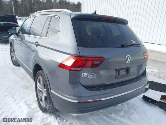 2020 Volkswagen Tiguan SE with VIN 3VV2B7AXXLM093989, listed as a IAAI auction lot 41599430 with 28,801 mi miles. Bid and sale history available at carsss.com. Image 3.