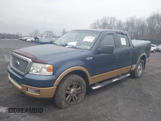 2005 Ford F-150 XLT with VIN 1FTPW14565KE80310, listed as a IAAI auction lot 41874484 with 173,315 mi miles. Bid and sale history available at carsss.com. Image 2.
