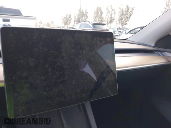 2023 Tesla Model Y Performance with VIN 7SAYGDEF6PF837174, listed as a IAAI auction lot 41436629 with 22,799 mi miles and . Bid and sale history available at DreamBid. Image 19.
