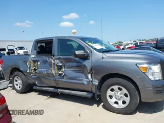 2020 Nissan Titan S with VIN 1N6AA1EE7LN504559, listed as a IAAI auction lot 42200436 with 65,925 mi miles and . Bid and sale history available at DreamBid. Image 13.