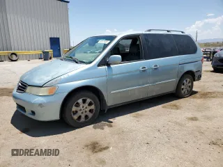 2003 Honda Odyssey EX-L with VIN 5FNRL18973B148286, listed as a Copart auction lot 63127535 with 200,031 mi miles and Salvage title. Bid and sale history available at DreamBid. Image 1.