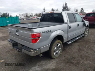2013 Ford F-150 XL with VIN 1FTFW1ET5DFE08014, listed as a IAAI auction lot 41690487 with 171,644 mi miles. Bid and sale history available at carsss.com. Image 4.
