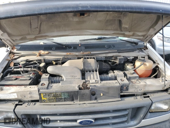 2004 Ford Econoline Passenger XL with VIN 1FMRE11W54HB15178, listed as a Copart auction lot 83088104 with 248,516 mi miles and Salvage Title. Bid and sale history available at DreamBid. Image 12.