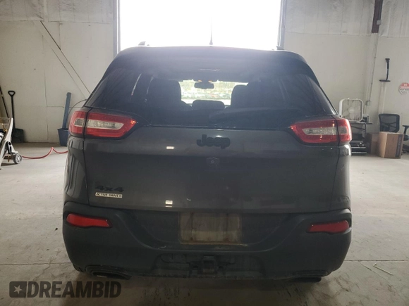 2015 Jeep Cherokee Latitude with VIN 1C4PJMCS4FW778081, listed as a Copart auction lot 48952285 with 184,999 mi miles and Salvage Title. Bid and sale history available at carsss.com. Image 6.