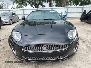 2013 Jaguar XK with VIN SAJWA4FB3DLB50331, listed as a Copart auction lot 66573384 with 109,887 mi miles and Salvage Title. Bid and sale history available at carsss.com. Image 5.