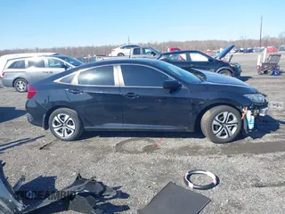 2018 Honda Civic LX with VIN 19XFC2F58JE042456, listed as a IAAI auction lot 41823195 with 45,291 mi miles and . Bid and sale history available at DreamBid. Image 14.