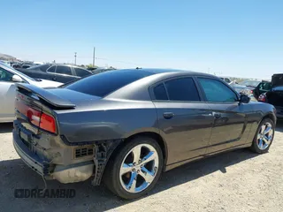2014 Dodge Charger SXT z VIN 2C3CDXHG3EH339404, wystawiony jako IAAI lot #42072957 z przebiegiem 125 183 mil mil oraz . Historia ofert i sprzedaży dostępna na DreamBid. Obrazek 14.