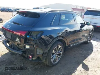 2021 Audi e-tron Premium Plus with VIN WA1LAAGE4MB010570, listed as a IAAI auction lot 41398464 with 67,721 mi miles. Bid and sale history available at carsss.com. Image 4.