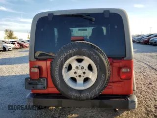 2003 Jeep Wrangler Sport with VIN 1J4FA49S43P332645, listed as a Copart auction lot 77424814 with 165,909 mi miles and Non Repairable. Bid and sale history available at carsss.com. Image 6.