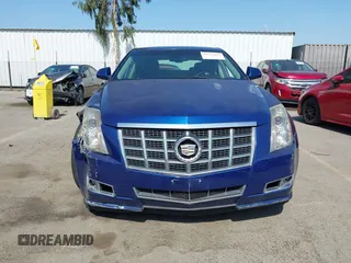 2012 Cadillac CTS Luxury with VIN 1G6DE5E59C0102621, listed as a IAAI auction lot 42554121 with 128,430 mi miles and . Bid and sale history available at DreamBid. Image 12.