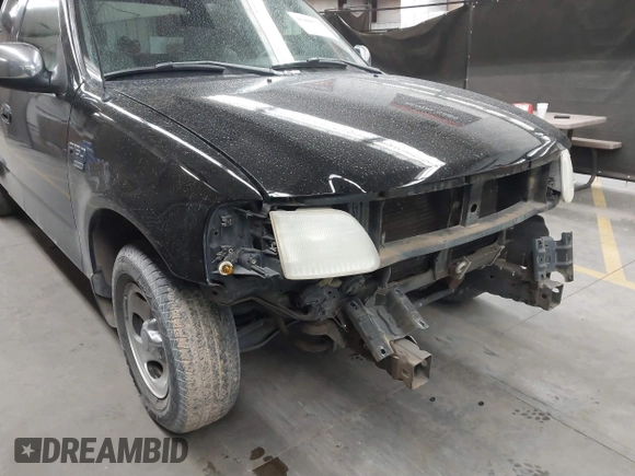 2001 Ford F-150 XL with VIN 1FTRX07W61KF82074, listed as a IAAI auction lot 41444721 with 125,494 mi miles. Bid and sale history available at carsss.com. Image 6.