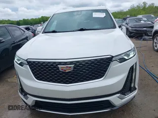 2021 Cadillac XT6 Premium Luxury z VIN 1GYKPDRS0MZ141453, wystawiony jako IAAI lot #42215954 z przebiegiem 144 245 mil mil oraz . Historia ofert i sprzedaży dostępna na DreamBid. Obrazek 13.