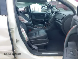 2014 Chevrolet Traverse LTZ with VIN 1GNKRJKD2EJ287211, listed as a IAAI auction lot 39873394 with 128,355 mi miles and . Bid and sale history available at DreamBid. Image 5.