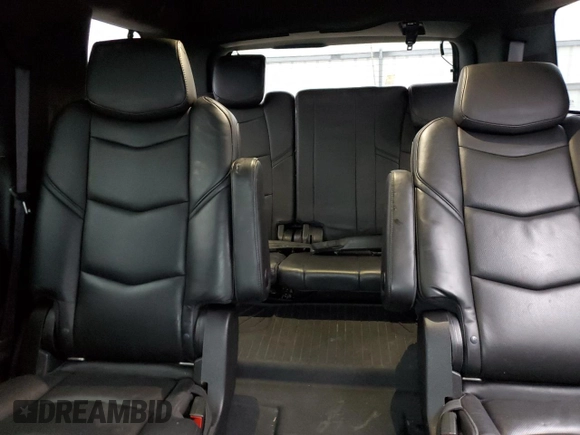2016 Cadillac Escalade Platinum z VIN 1GYS4DKJ3GR354153, wystawiony jako Copart lot #82494394 z przebiegiem 124 561 mil mil oraz Szkoda całkowita • Salvage title. Historia ofert i sprzedaży dostępna na DreamBid. Obrazek 10.