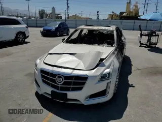 2014 Cadillac CTS Performance RWD с VIN 1G6AS5S35E0130174, выставлен на аукционе Copart как лот 61251475 с пробегом Не указан миль и На запчасти • Non repairable. История ставок и продаж доступна на DreamBid. Изображение 12.