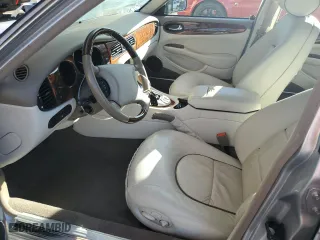 2000 Jaguar XJ VDP with VIN SAJDA24C2YLF03686, listed as a Copart auction lot 77023654 with 215,569 mi miles and Salvage Title. Bid and sale history available at carsss.com. Image 7.