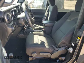 2023 Jeep Wrangler Sport with VIN 1C4HJXAG3PW618988, listed as a Copart auction lot 71615934 with 34,342 mi miles and Salvage title. Bid and sale history available at DreamBid. Image 7.