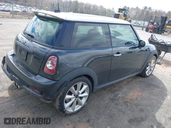 2013 MINI Hardtop S with VIN WMWSV3C50DT394345, listed as a IAAI auction lot 41738216 with 58,241 mi miles and . Bid and sale history available at DreamBid. Image 4.