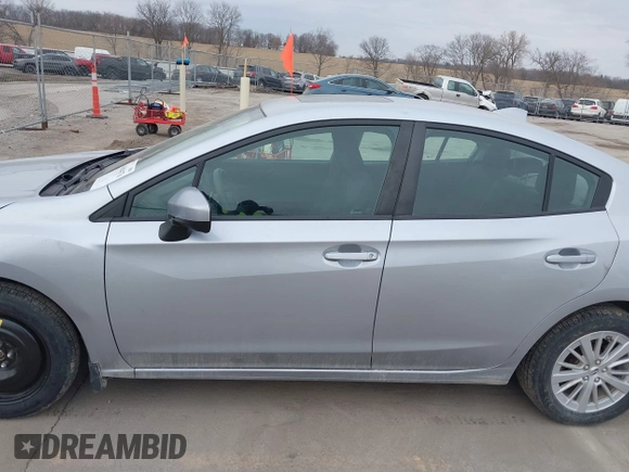 2018 Subaru Impreza Premium z VIN 4S3GKAD67J3604898, wystawiony jako IAAI lot #41694176 z przebiegiem 97 287 mil mil oraz . Historia ofert i sprzedaży dostępna na DreamBid. Obrazek 14.
