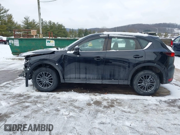 2019 Mazda CX-5 Sport with VIN JM3KFBBM8K1621929, listed as a IAAI auction lot 41356228 with 67,023 mi miles and . Bid and sale history available at DreamBid. Image 15.