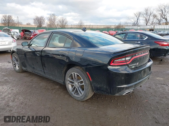 2019 Dodge Charger SXT with VIN 2C3CDXJG3KH630975, listed as a IAAI auction lot 41580174 with 74,575 mi miles and . Bid and sale history available at DreamBid. Image 3.