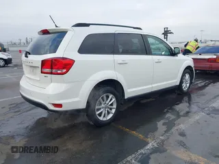 2015 Dodge Journey SXT with VIN 3C4PDDBG9FT600712, listed as a IAAI auction lot 42090741 with 111,741 mi miles and . Bid and sale history available at DreamBid. Image 4.