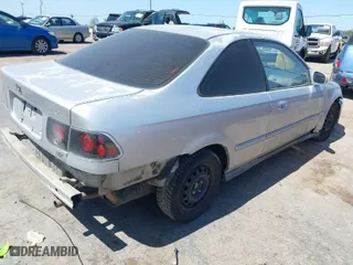 1996 Honda Civic EX with VIN 1HGEJ8241TL022546, listed as a IAAI auction lot 42036699 with 156,980 mi miles. Bid and sale history available at carsss.com. Image 4.