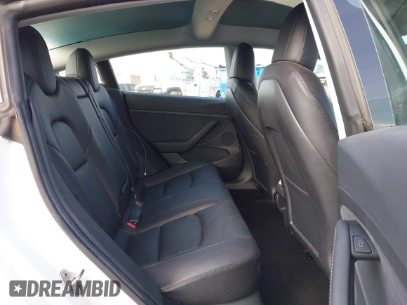 2022 Tesla Model 3 with VIN 5YJ3E1EA1NF167711, listed as a IAAI auction lot 41594266 with 50,554 mi miles and . Bid and sale history available at DreamBid. Image 8.