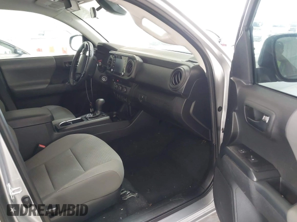 2021 Toyota Tacoma SR with VIN 3TYAX5GN9MT019636, listed as a IAAI auction lot 42497197 with 48,041 mi miles and . Bid and sale history available at DreamBid. Image 5.