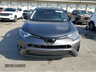 2018 Toyota RAV4 LE with VIN JTMBFREV5JJ736492, listed as a Copart auction lot 63794335 with 97,374 mi miles and Clean title. Bid and sale history available at DreamBid. Image 5.