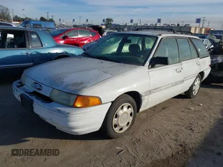 1995 Ford Escort z VIN 3FASP15J4SR123210, wystawiony jako IAAI lot #41397803 z przebiegiem 72 765 mil mil oraz . Historia ofert i sprzedaży dostępna na DreamBid. Obrazek 2.