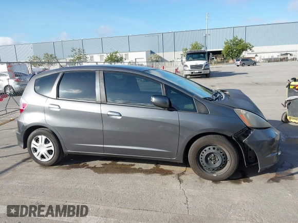 2013 Honda Fit with VIN JHMGE8H32DC018130, listed as a IAAI auction lot 41980172 with 98,452 mi miles. Bid and sale history available at carsss.com. Image 13.