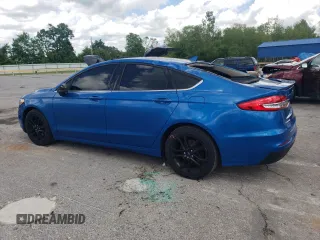2020 Ford Fusion SE z VIN 3FA6P0HD9LR148574, wystawiony jako Copart lot #56694155 z przebiegiem 89 994 mil mil oraz Szkoda całkowita • Salvage title. Historia ofert i sprzedaży dostępna na DreamBid. Obrazek 2.