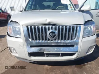 2009 Mercury Mariner Premier z VIN 4M2CU87G69KJ11232, wystawiony jako IAAI lot #41761605 z przebiegiem 63 239 mil mil oraz . Historia ofert i sprzedaży dostępna na DreamBid. Obrazek 6.