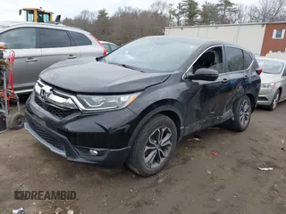 2021 Honda CR-V EX-L with VIN 2HKRW2H87MH639805, listed as a IAAI auction lot 41699013 with 73,304 mi miles. Bid and sale history available at carsss.com. Image 2.