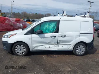 2019 Ford Transit Connect XL with VIN NM0LS6E29K1391292, listed as a IAAI auction lot 41801140 with 90,463 mi miles and . Bid and sale history available at DreamBid. Image 14.
